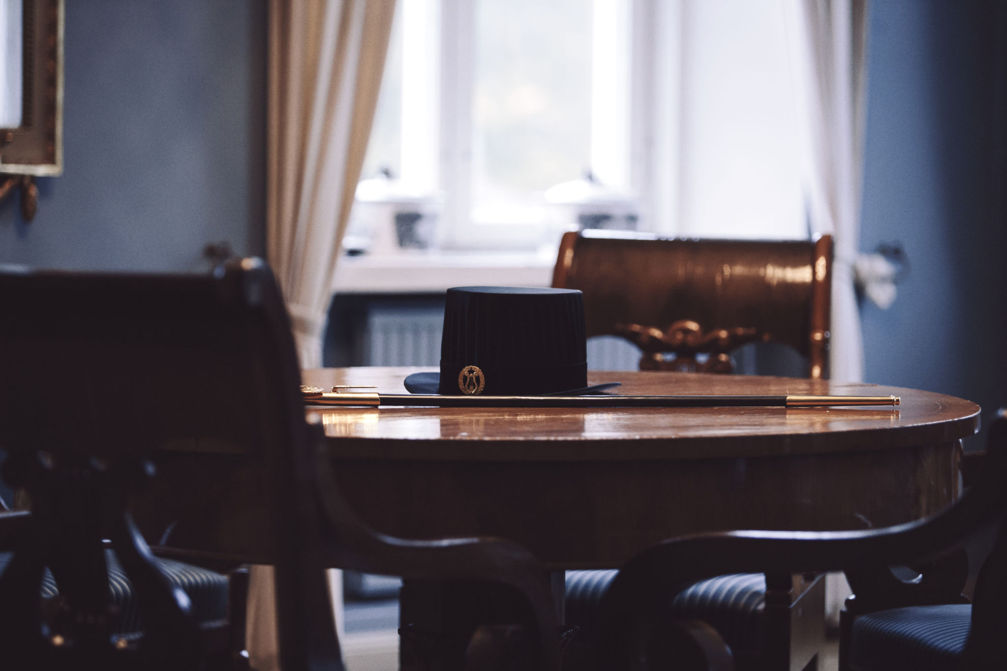 Doktorshatt och -värja.