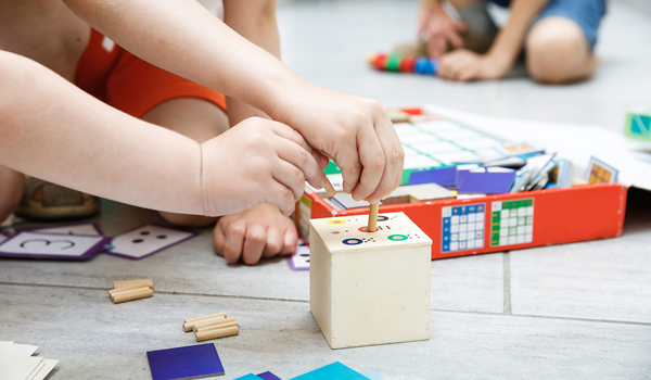 Children Playing With Homemade Educational Toys