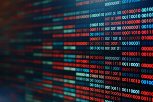 Binär data, alltså nollor och ettor, i rött och blått.
