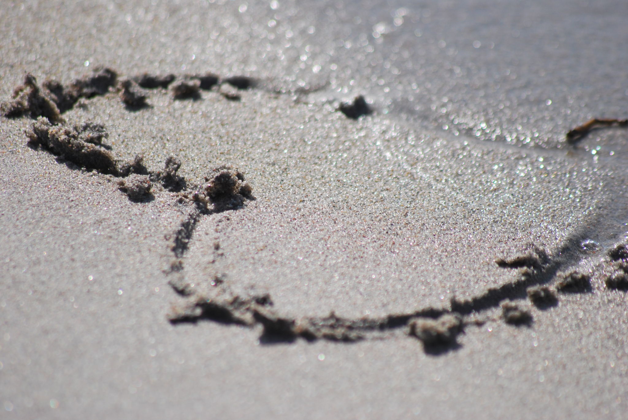 Hjärta ritad i sanden